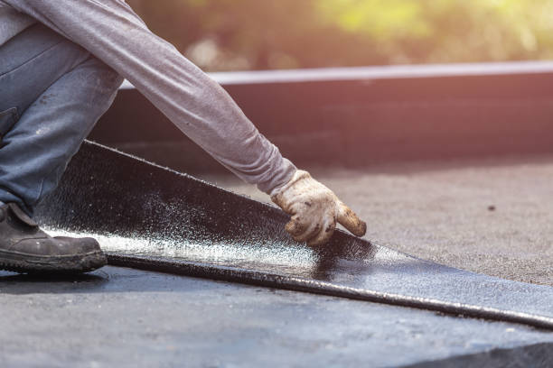 Professional Emergency Waterproofing technician working in Ottawa, KS